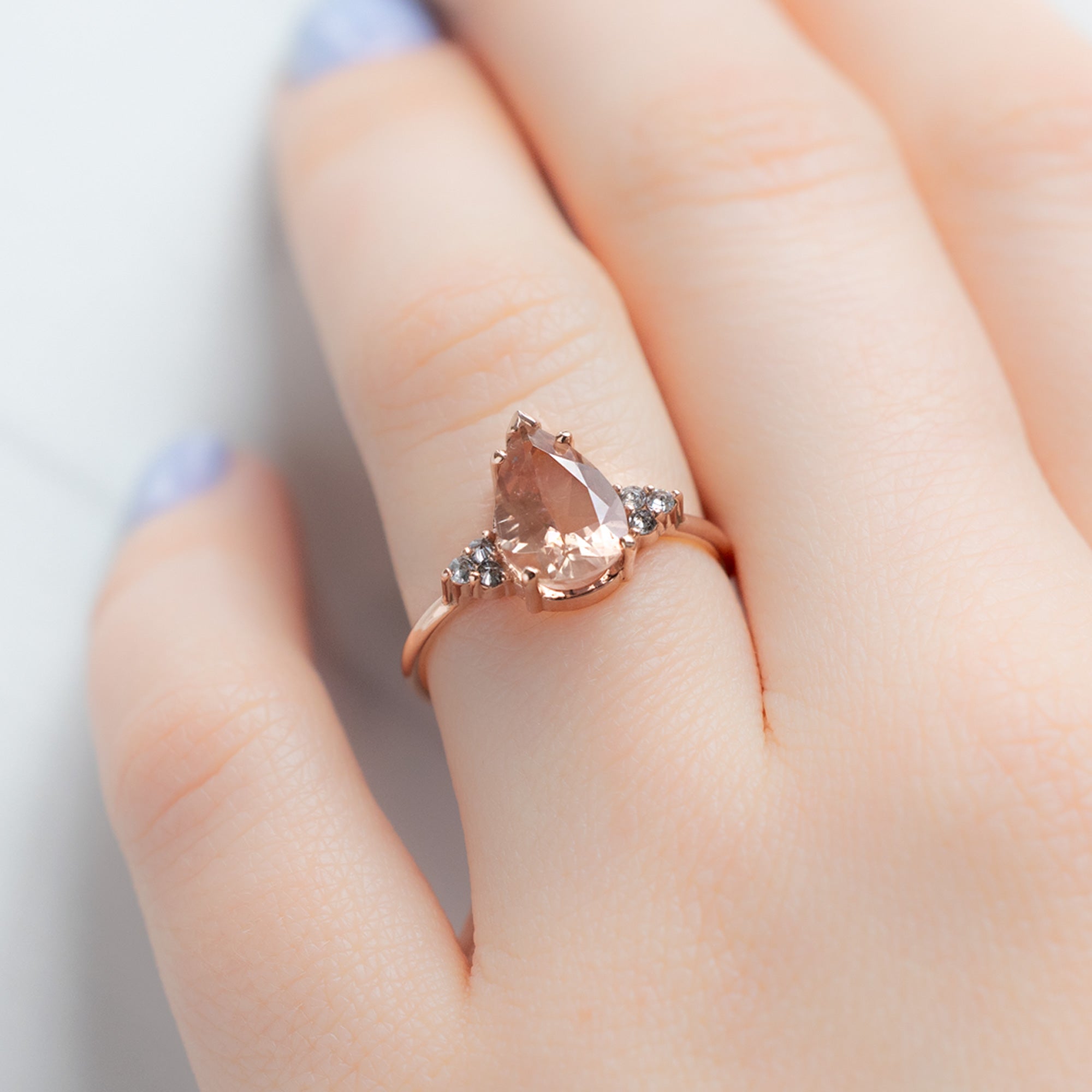 The Ivy Ring with a 1.87ct Pear Sunstone in 14K Rose Gold on Model