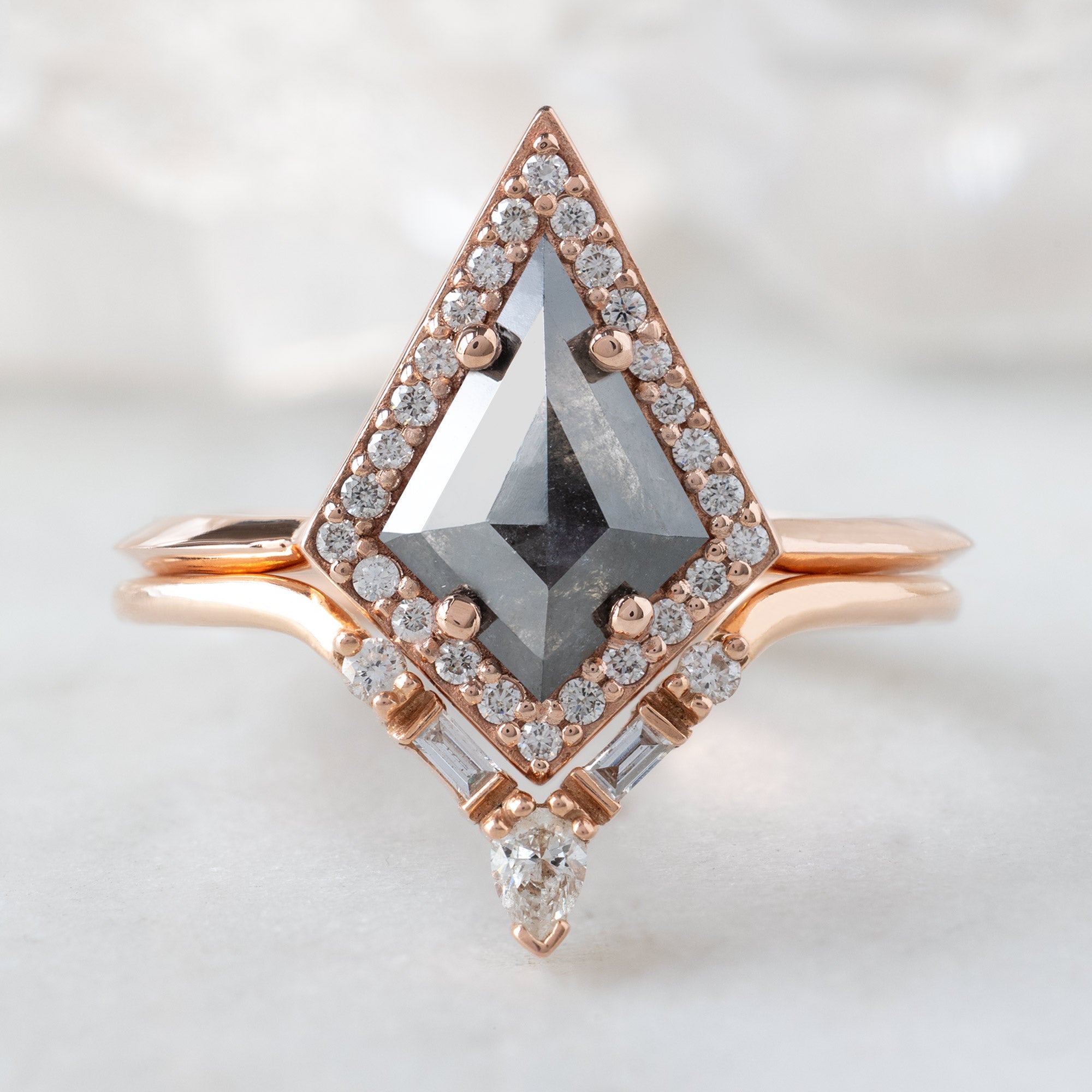 The Dahlia Ring with a 0.89ct Black Kite Diamond in 14K Rose Gold Stacked with the White Diamond Tiara Stacking Band