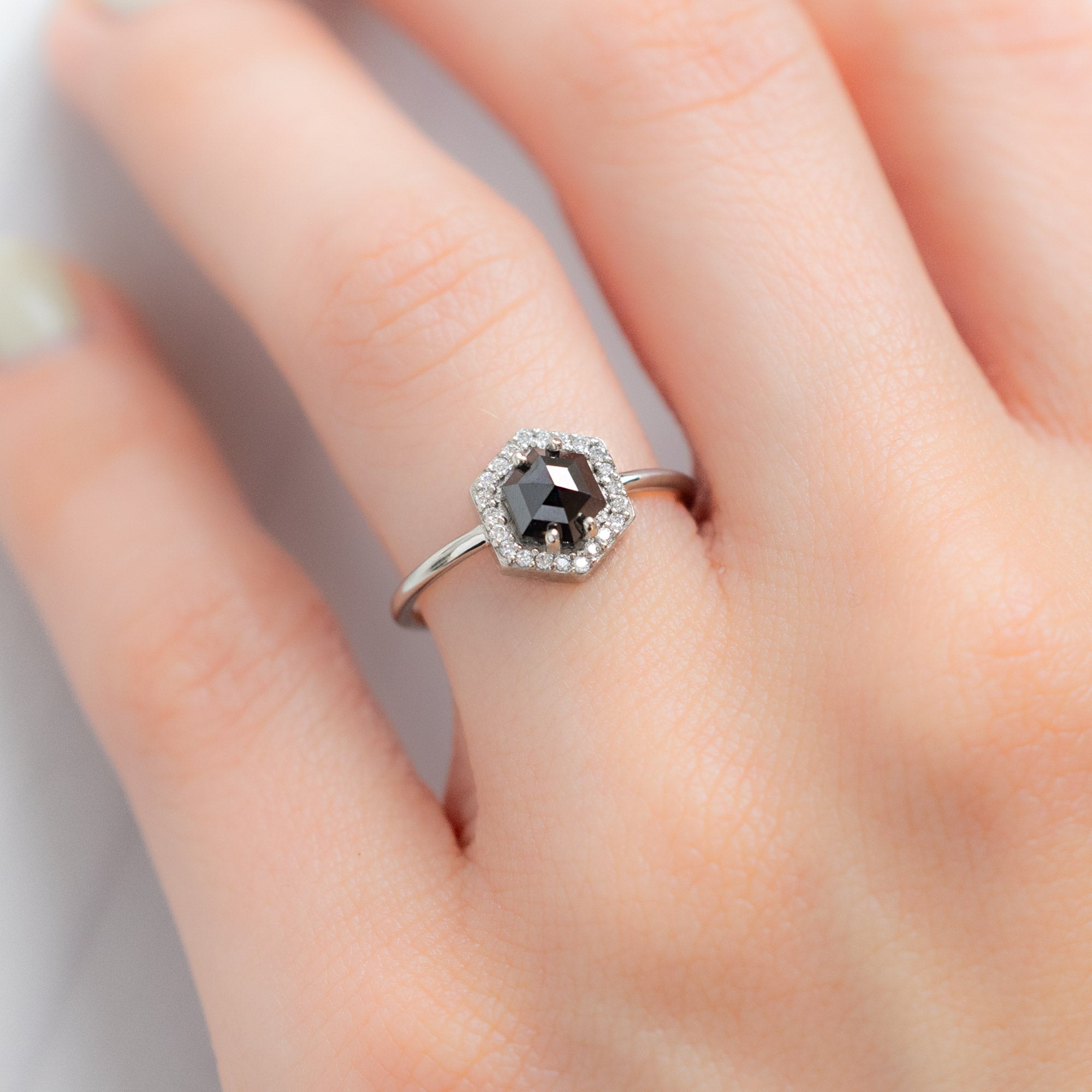 The Dahlia Ring with a 1.38ct Hexagon Black Diamond in 14K White Gold on Model