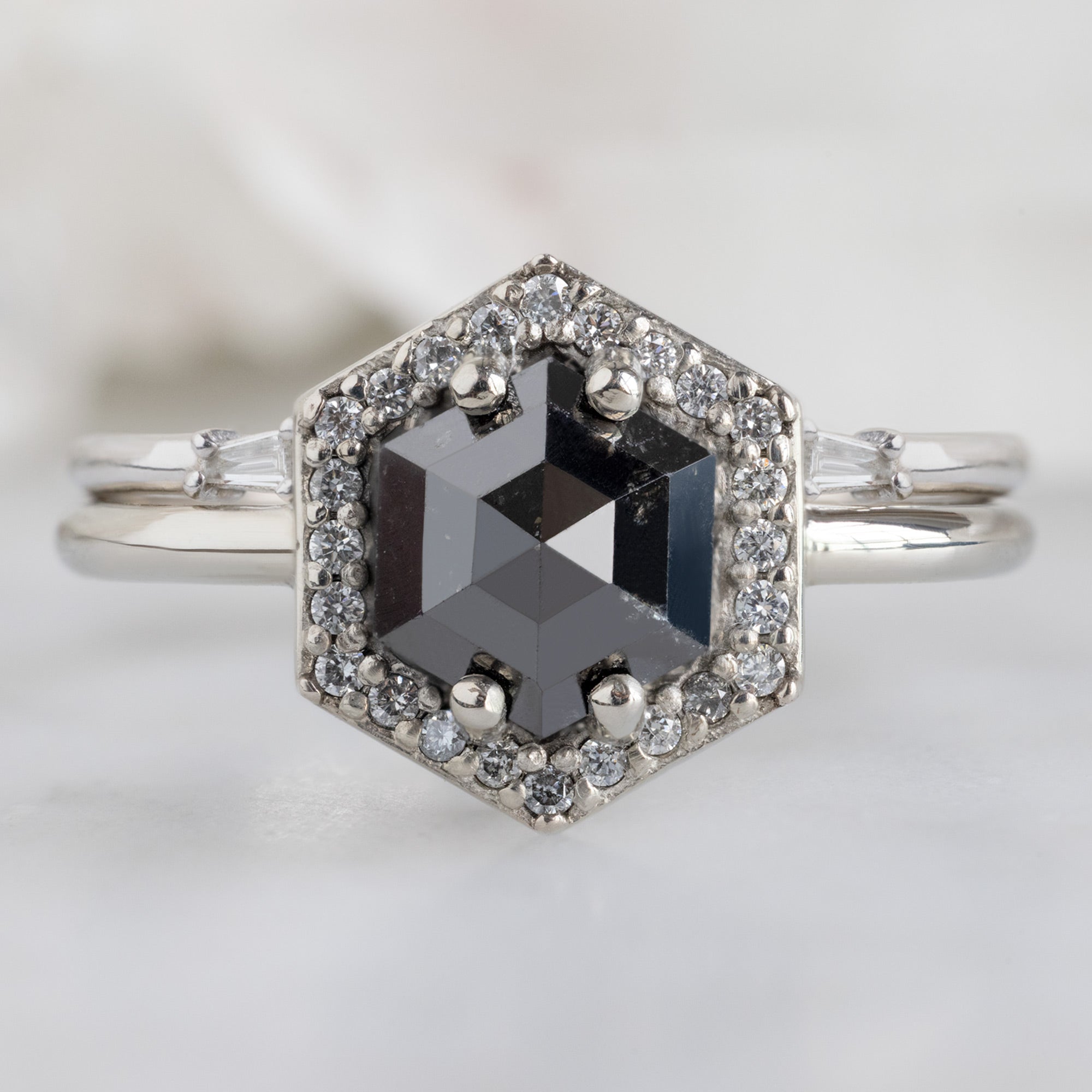 The Dahlia Ring with a 1.38ct Hexagon Black Diamond in 14K White Gold Stacked with the Open Cuff Baguette Diamond Stacking Band