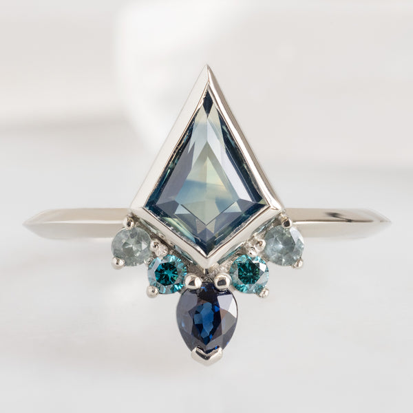 The Watercolor Aster Ring with a 1.17ct Kite Shaped Parti Sapphire in 14K White Gold on white background