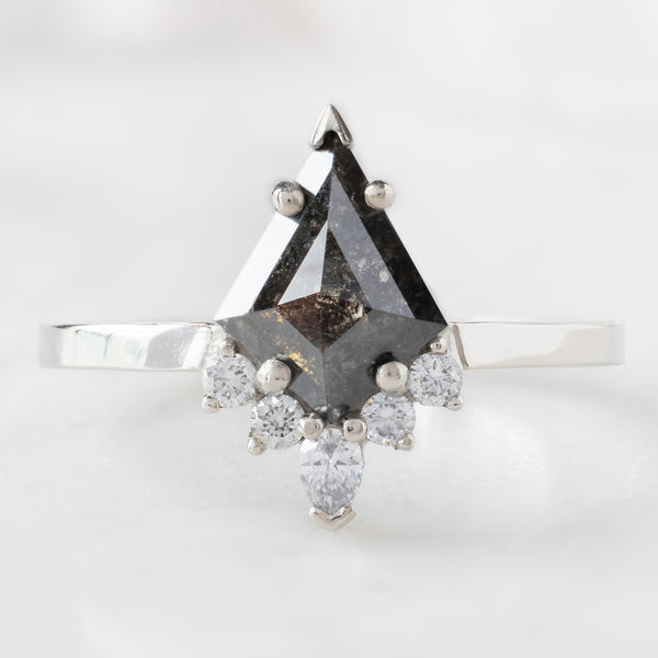 The Aster Ring with a 0.94ct Kite Black Diamond in 14K White Gold on White Marble