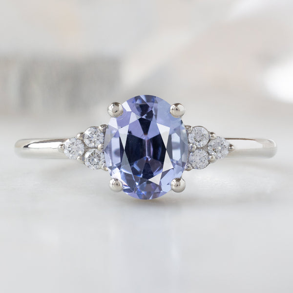 The Ivy Ring with a 1.08ct Oval Purple Tanzanite in 14K White Gold on White Marble