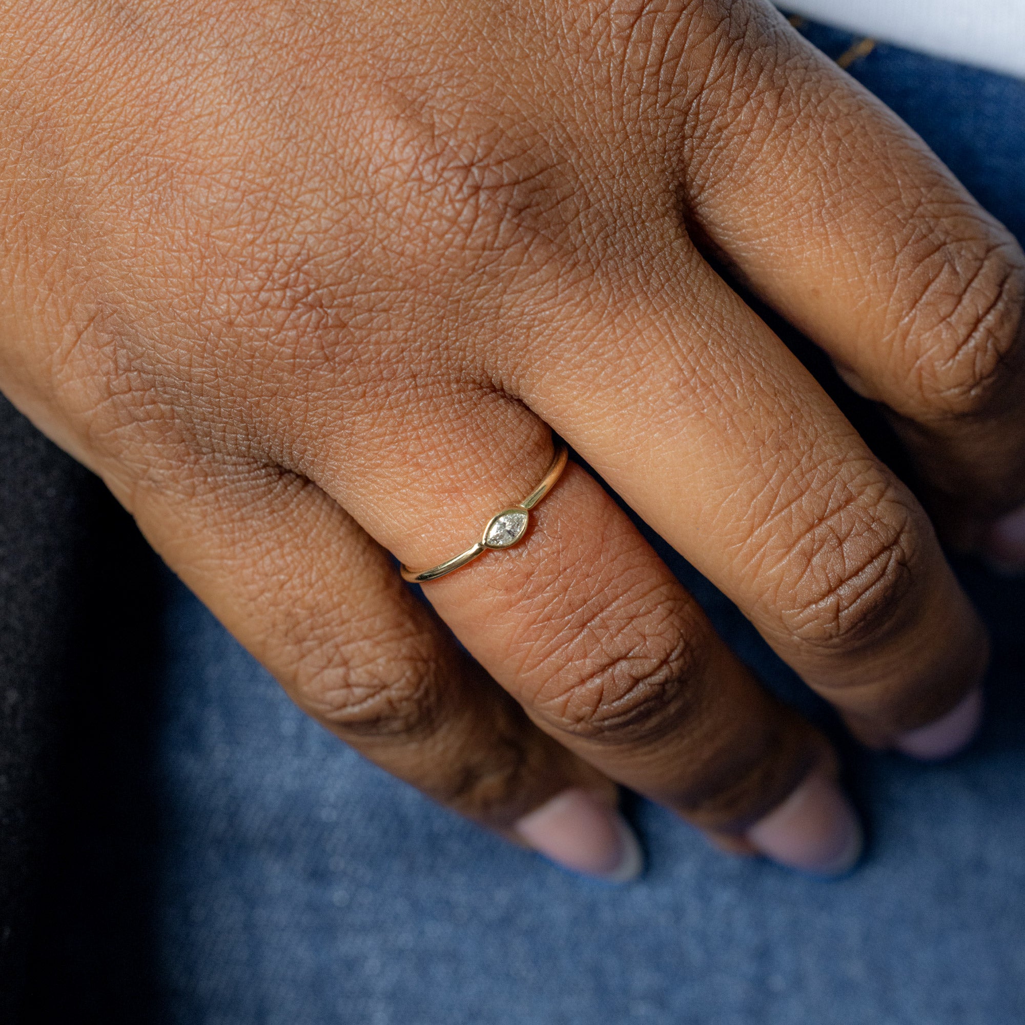 Marquise Diamond Stacking Ring in 10K Yellow Gold on Model with hand in pocket