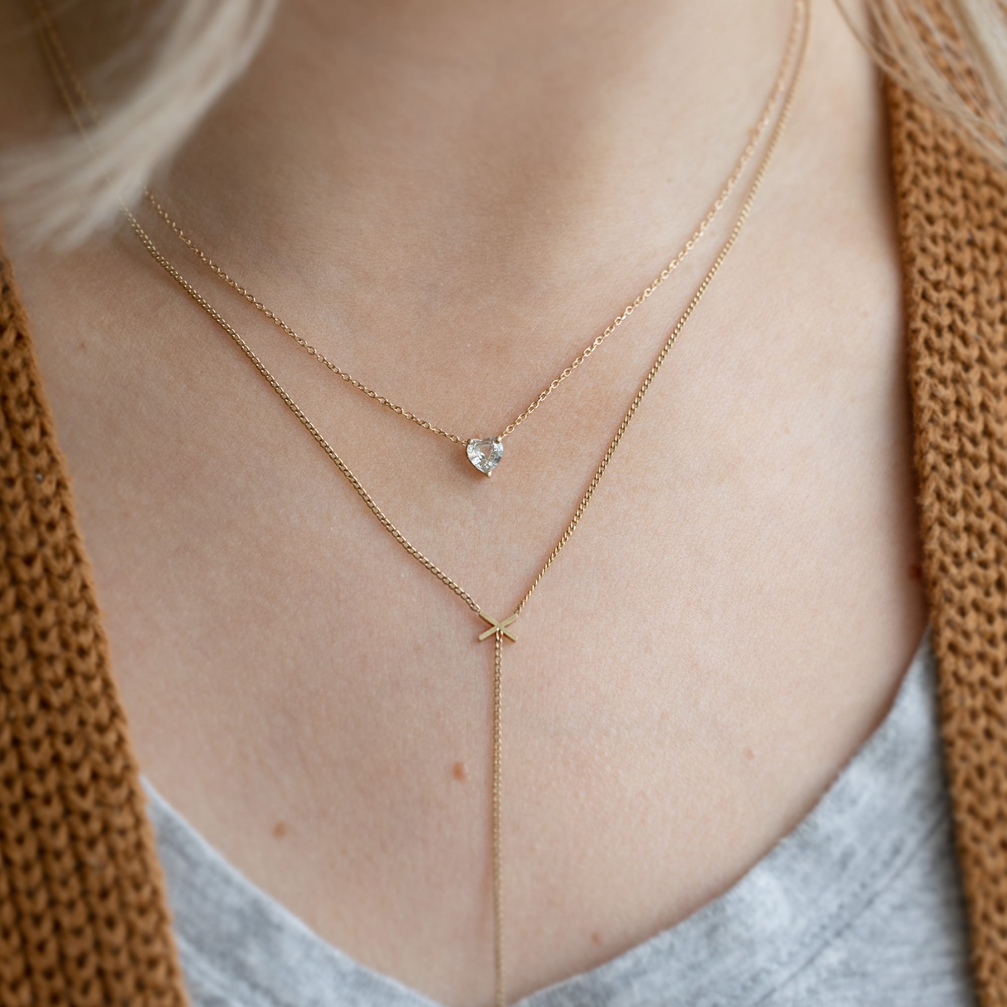 buy:the-xo-lariat-necklace-14k-yellow-gold,the-white-sapphire-gemstone-heart-necklace-10k-yellow-gold