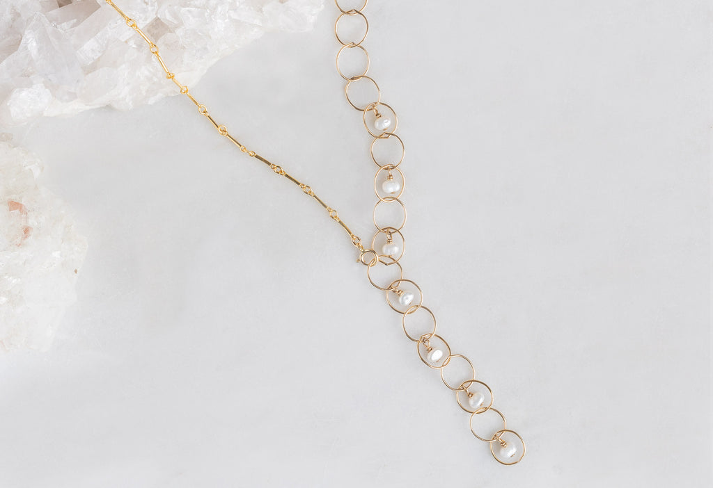 Pearl Party 2-in-1 Necklace on White Marble Tile