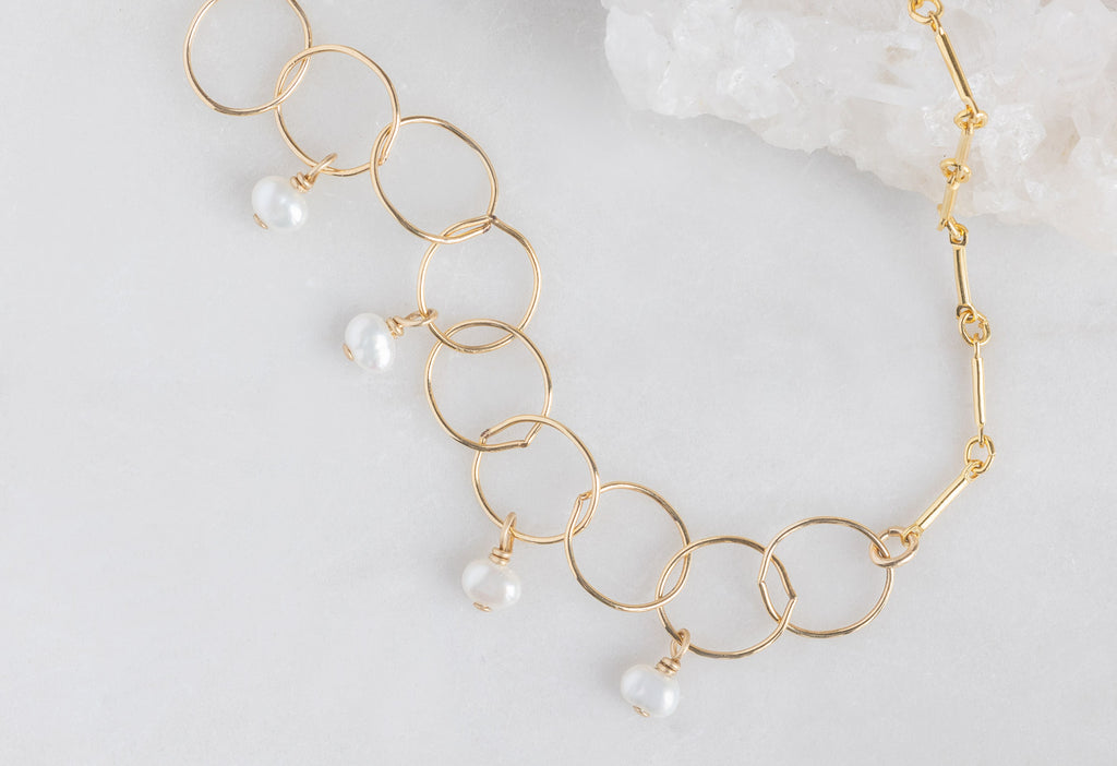 Pearl Party Chain Bracelet Close Up on White Marble