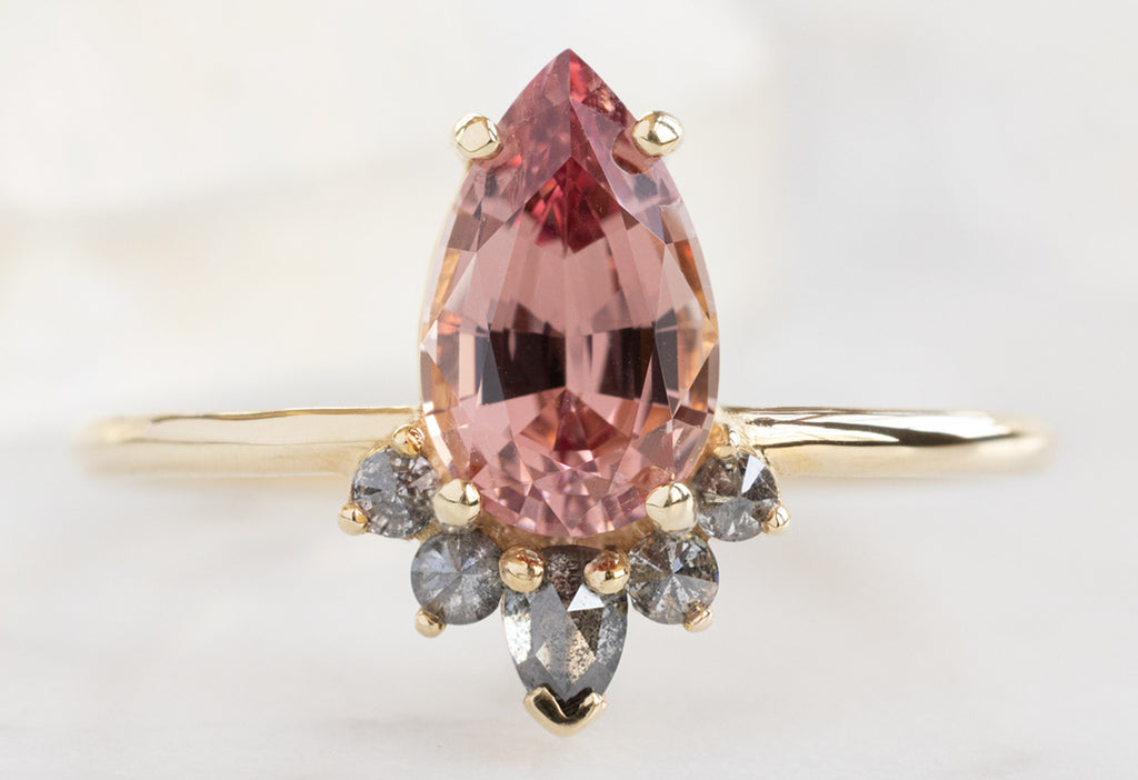 The Aster Ring with a 1.59ct Pear-Cut Garnet