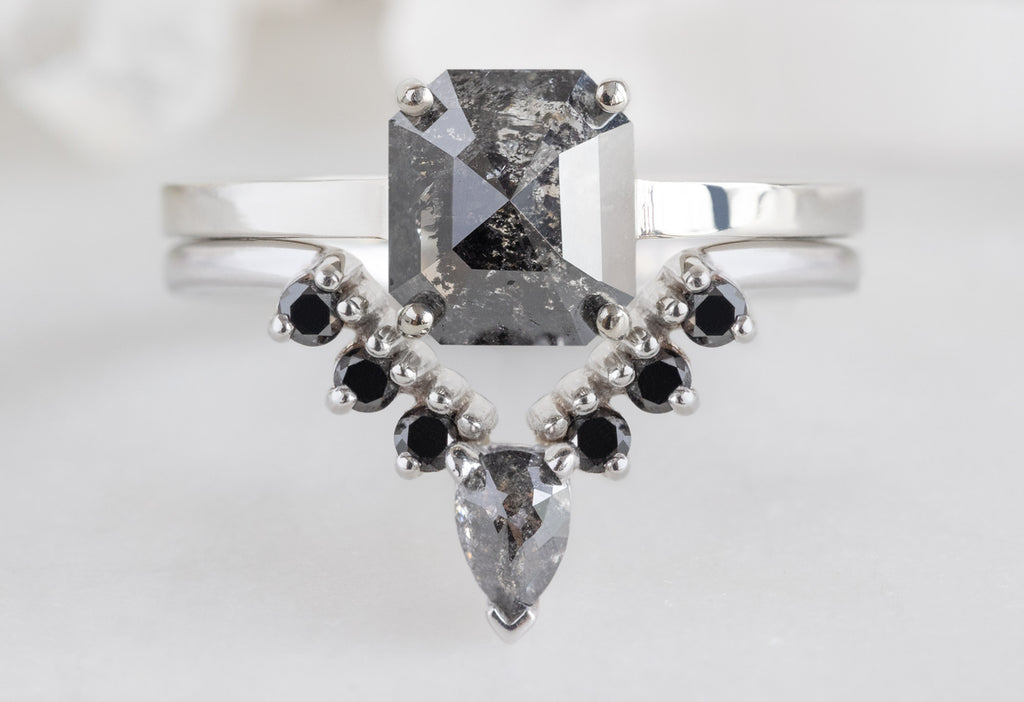 The Bryn Ring with an Emerald-Cut Black Diamond with Black Diamond Sunburst Stacking Band