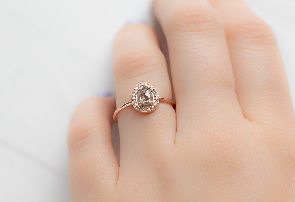 The Dahlia Ring with a Rose-Cut Champagne Diamond on Model