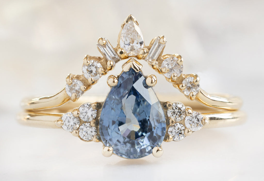 The Ivy Ring with a 1.12ct Pear-Cut Sapphire with Geometric Diamond Sunburst Stacking Band