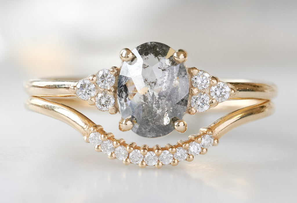 The Ivy Ring with an Oval-Cut Salt and Pepper Diamond with Pavé Arc Stacking Band