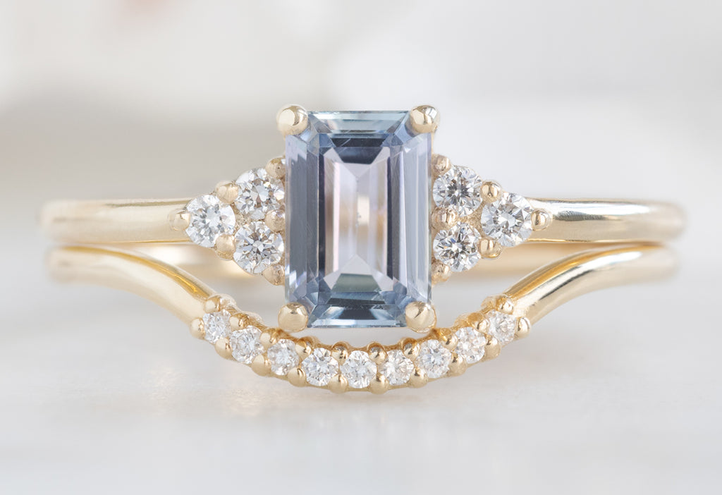 The Ivy Ring with an Emerald-Cut Tanzanite with Pavé Arc Stacking Band