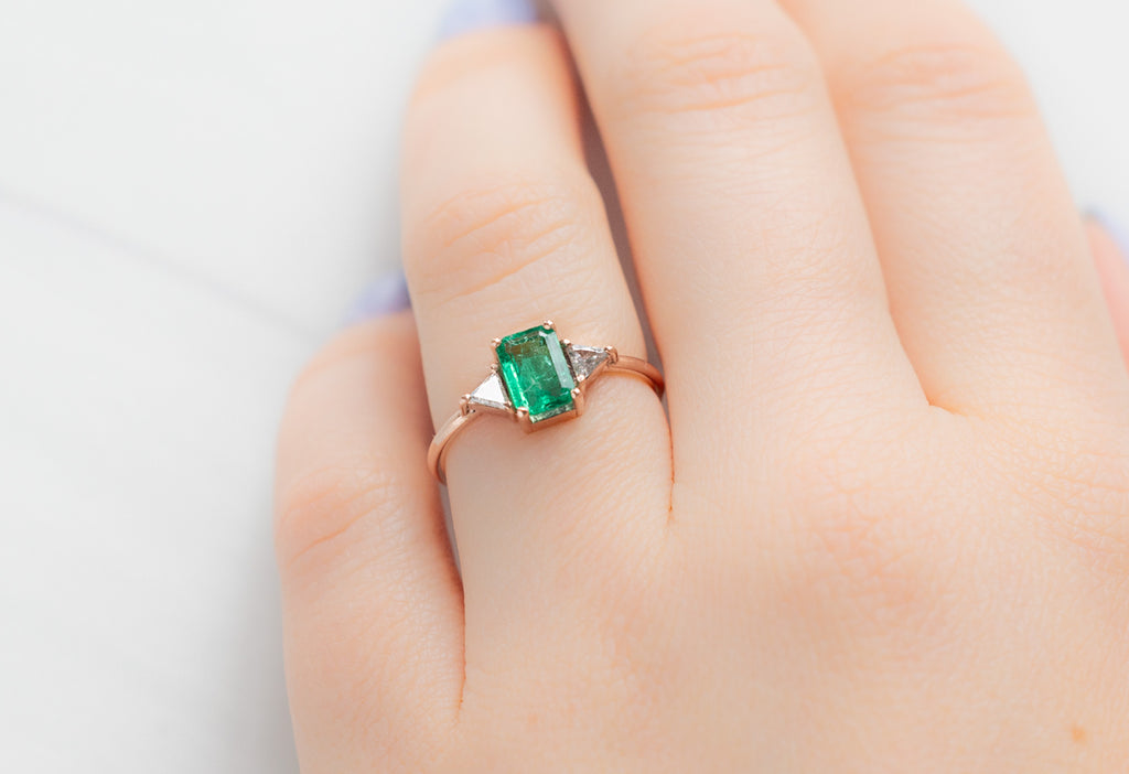 The Jade Ring with an Emerald-Cut Emerald on Model