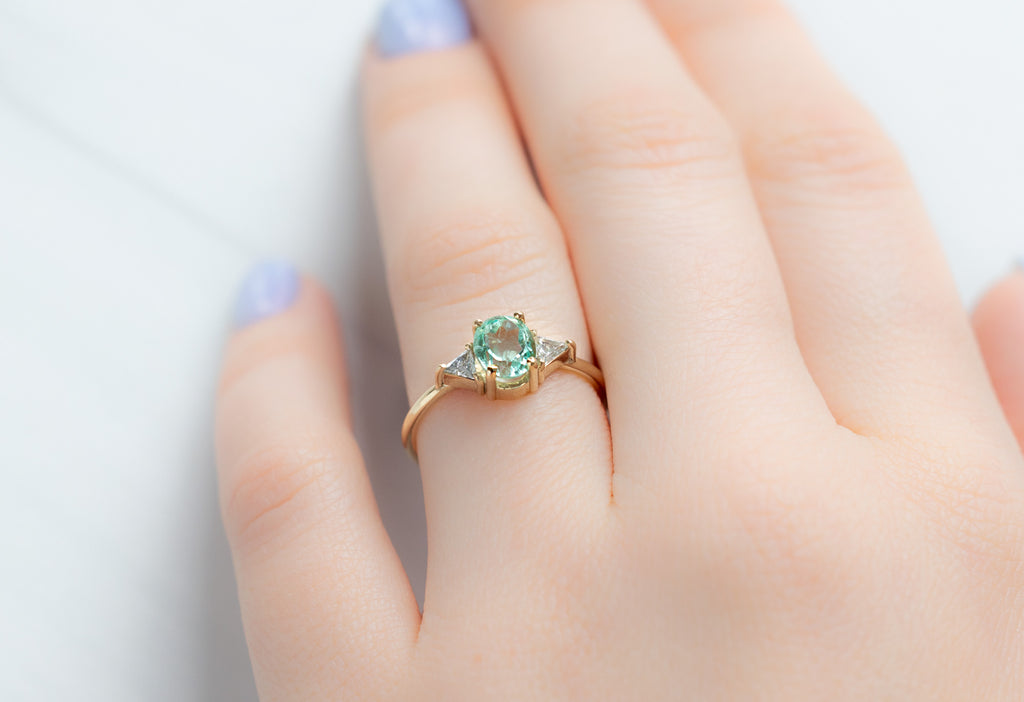 The Jade Ring with an Oval-Cut Emerald on Model