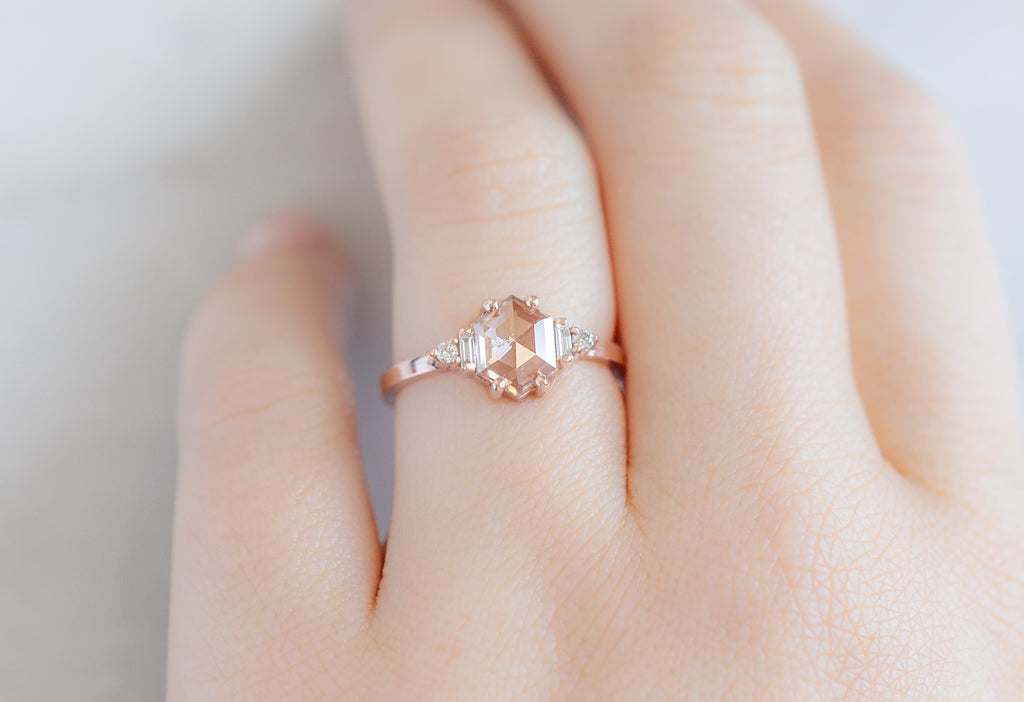The Primrose Ring with a .81ct Lab Grown Pink Hexagon Diamond on Model