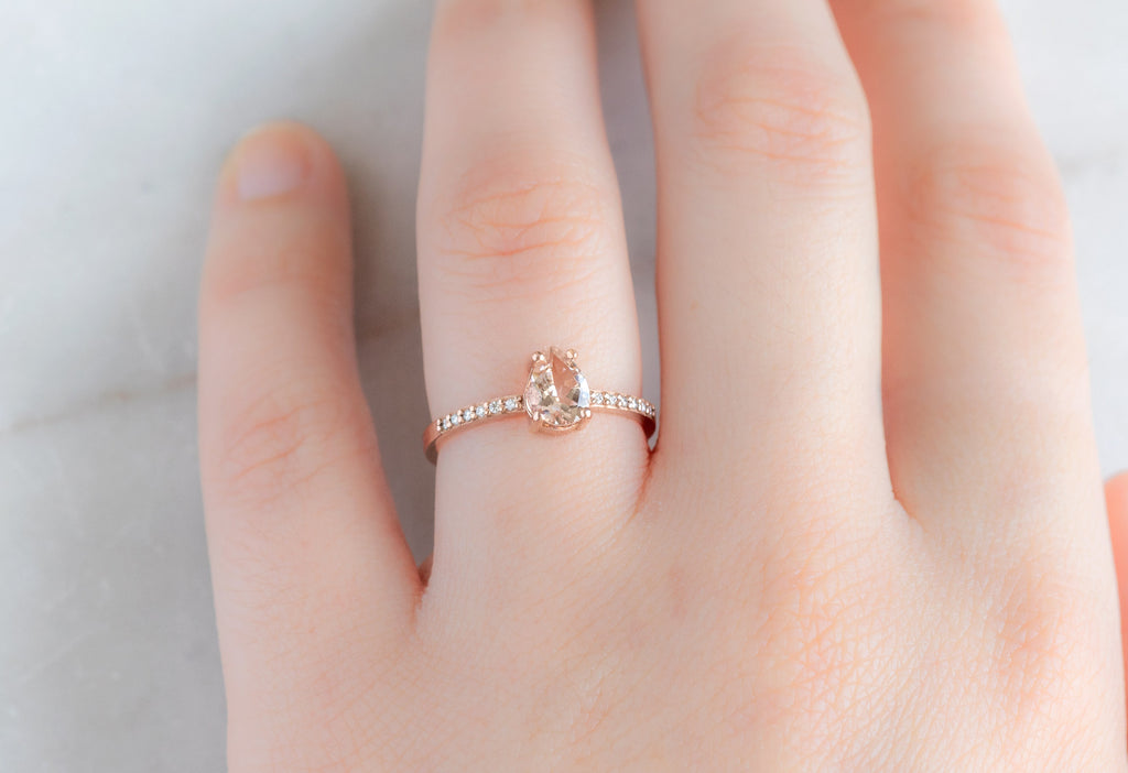 The Willow Ring with a Pear-Cut Morganite on Model