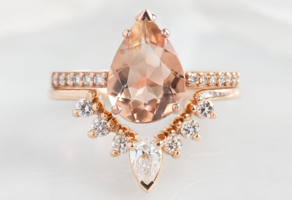 The Willow Ring with a Pear-Cut Sunstone with the White Diamond Sunburst Stacking Band