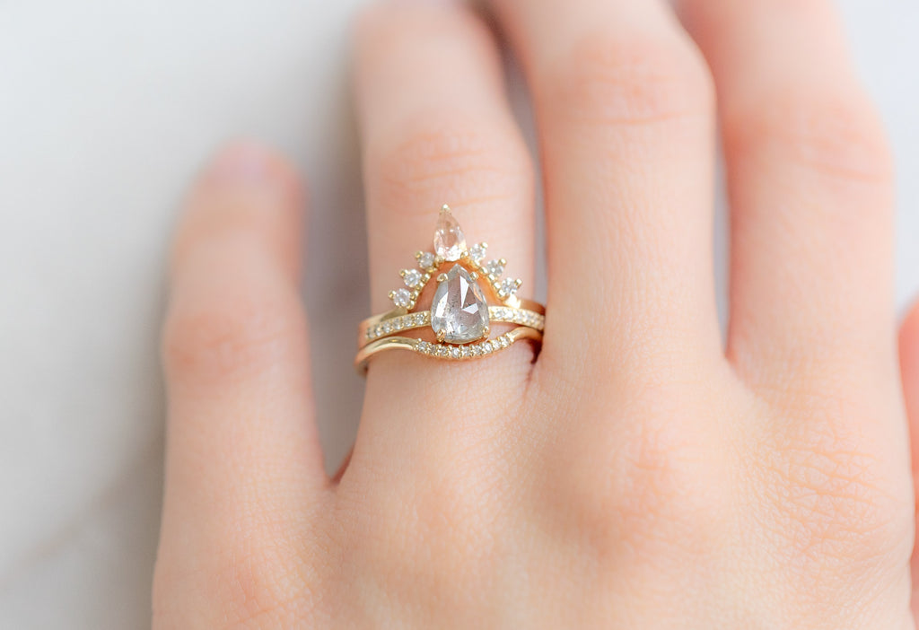 The Willow Ring with a Rose-Cut Icy-White Diamond with White Diamond Stacking Bands on Model