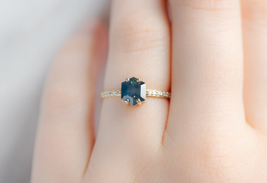 The Willow Ring with a Sapphire Hexagon on Model