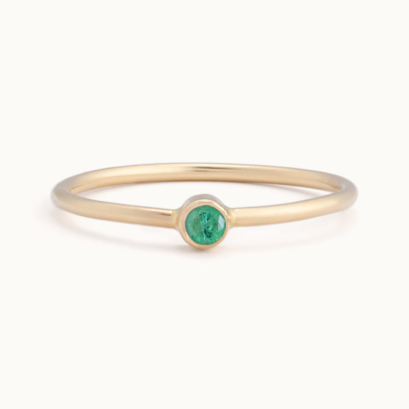 Custom Emerald Birthstone Stacking Ring | 10K Yellow Gold with white background. 