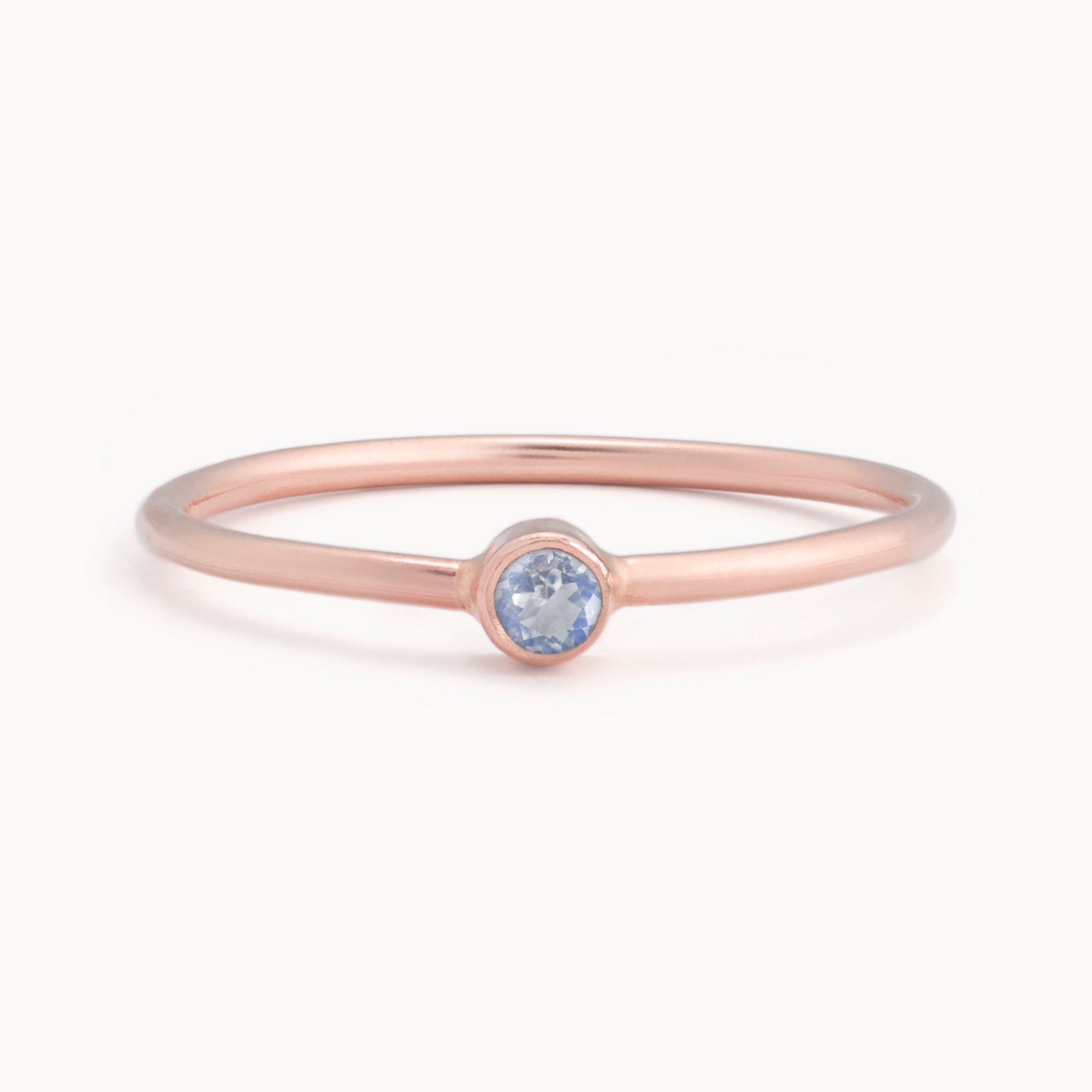 Custom Moonstone Birthstone Stacking Ring | 10K Rose Gold with white background. 