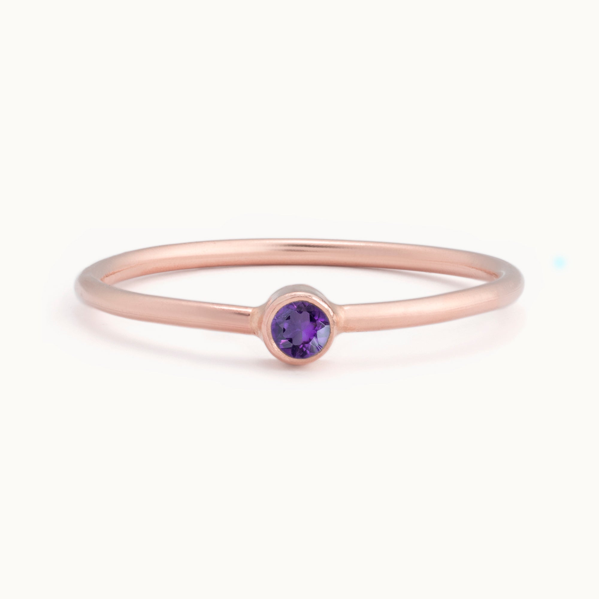 Custom Amethyst Birthstone Stacking Ring | 10K Rose Gold with white background. 