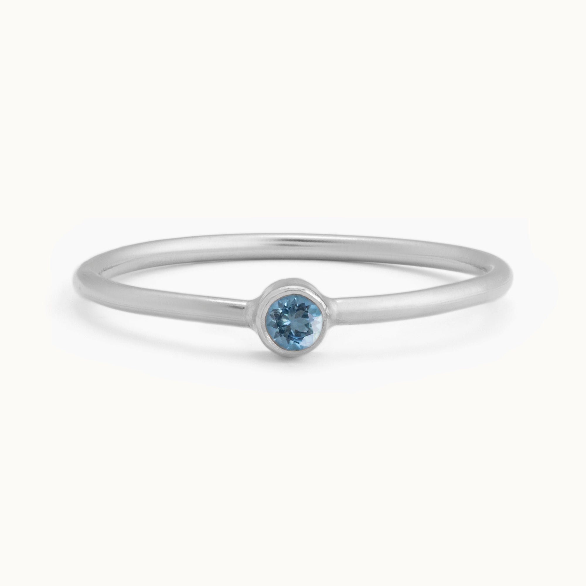 Custom Aquamarine Birthstone Stacking Ring | 10K White Gold with white background. 