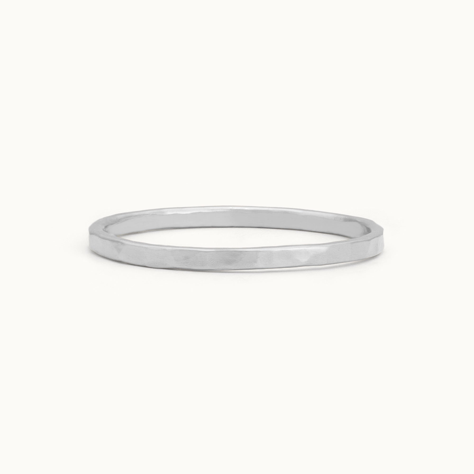 The Gold Stacking Wedding Ring | Hammered Texture in 14K White Gold with white background. 