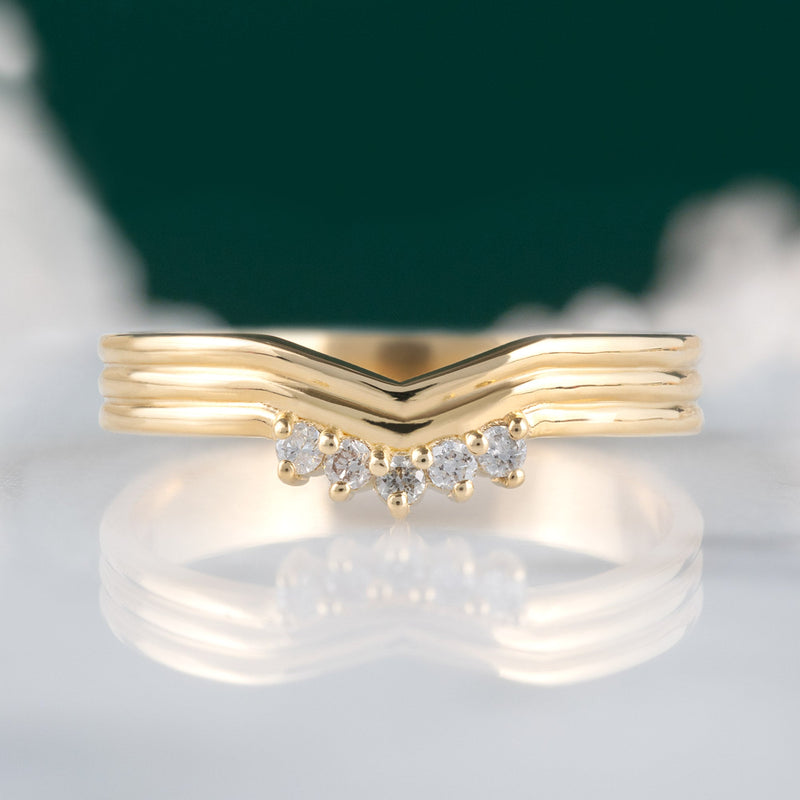 Custom Peak Stratum Stacking Band with Lab Grown Diamonds | 18K Yellow Gold displayed on marble surface.