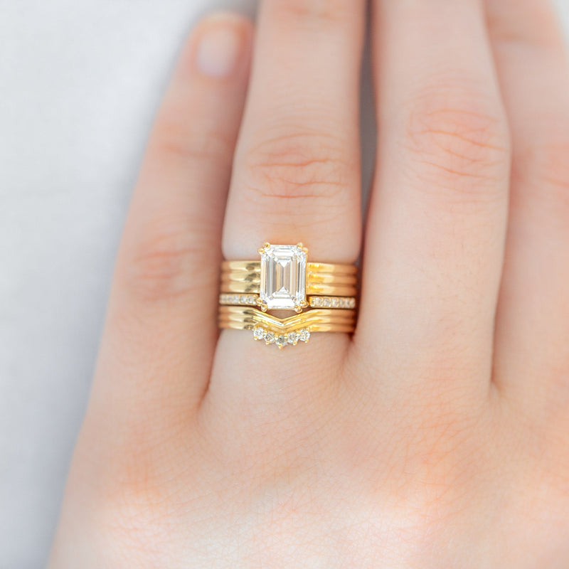 Custom Peak Stratum Stacking Band with Lab Grown Diamonds | 18K Yellow Gold paired with two other rings on model's left hand ring finger.