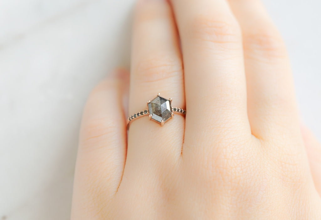 The Willow Ring with a Black Hexagon Diamond on Model