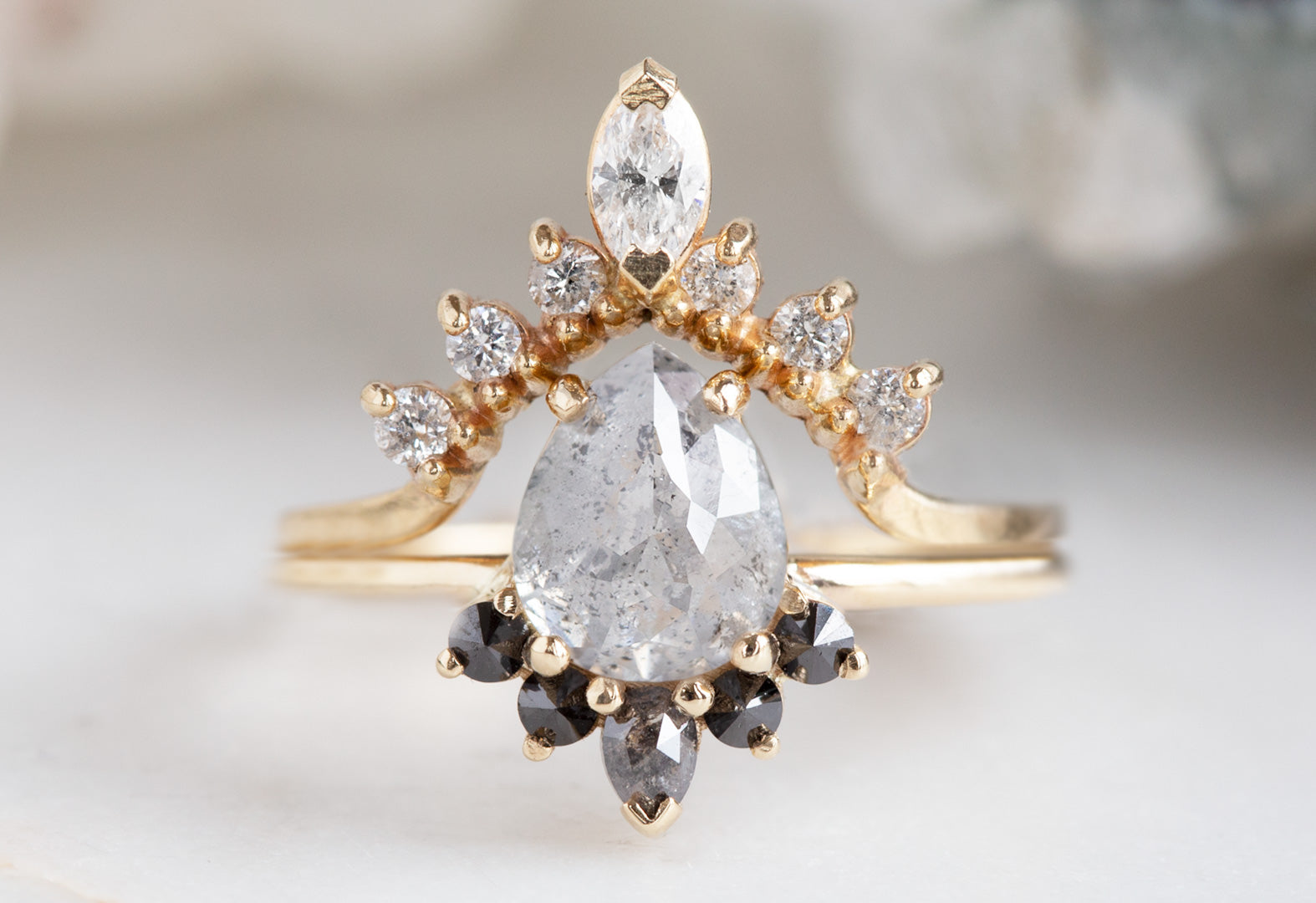 The Aster Ring with a Pear-Cut White Diamond